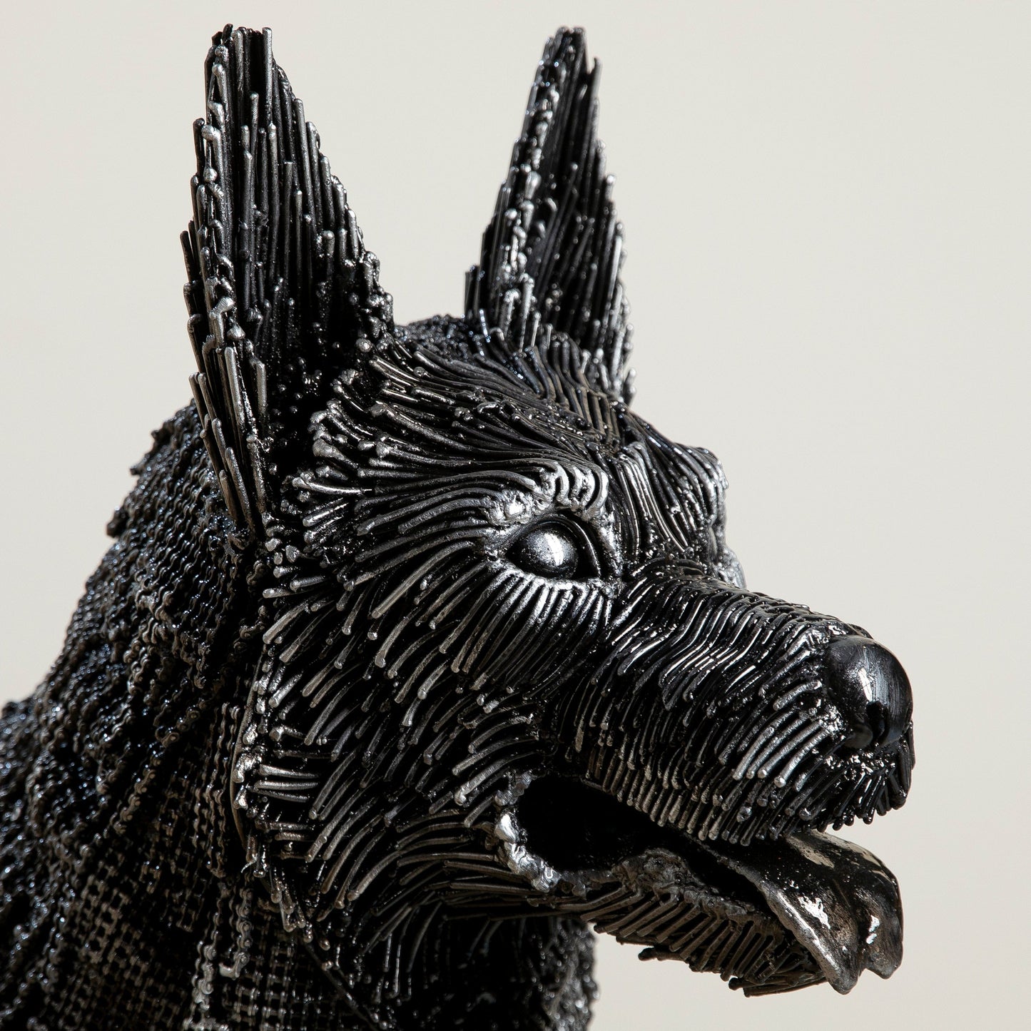 German Shepherd metal sculpture angle view