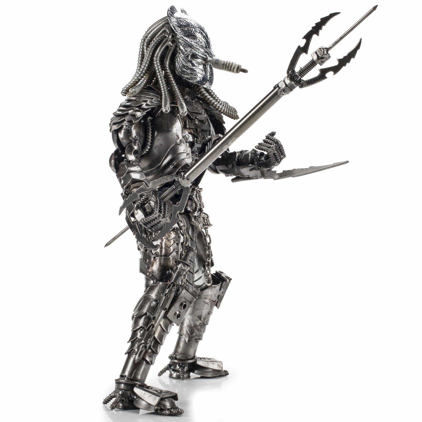 Predator brass sculpture angle view