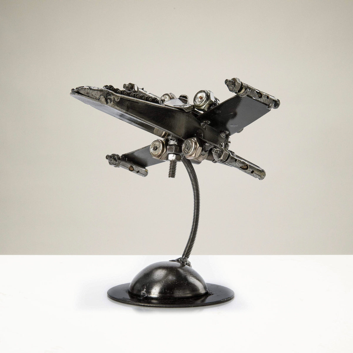 Star Wars-inspired metal art — X-Wing inspired recycled metal sculpture — Vault 88