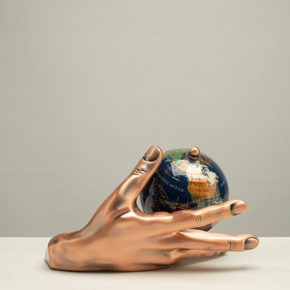 World In Your Hand - Gemstone Globe with Lapis Ocean Embraced with Copper Base — Vault 88