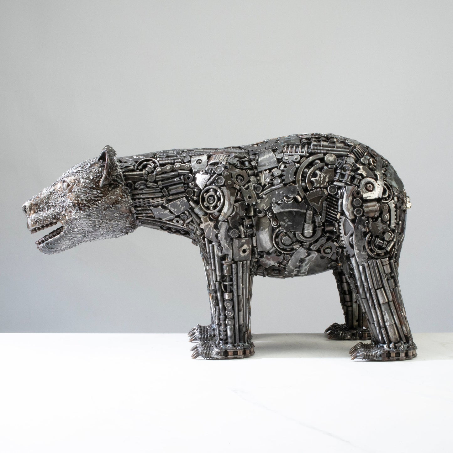 Bear metal sculpture face detail