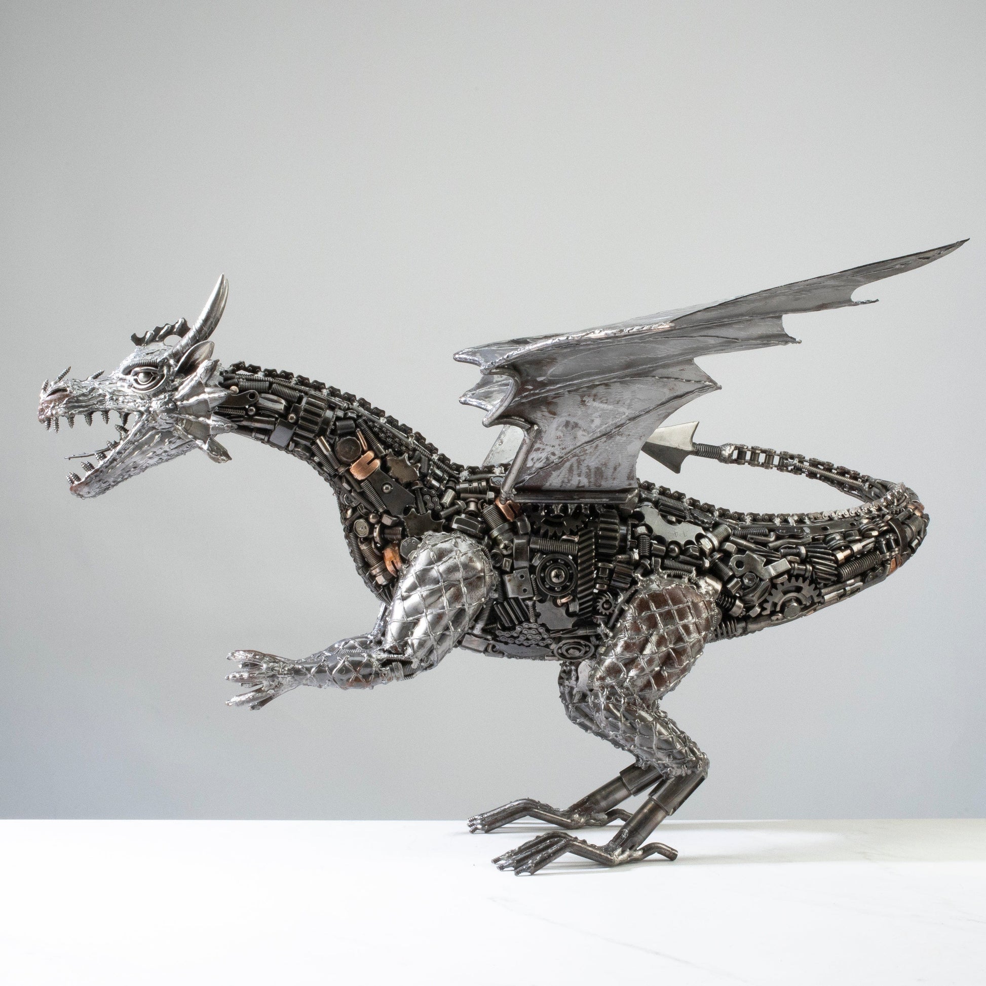 Dragon metal sculpture scale detail