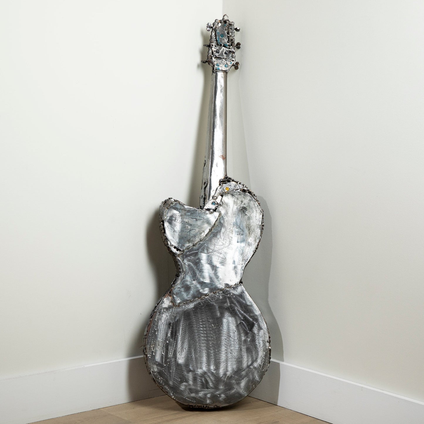 Guitar metal sculpture neck detail
