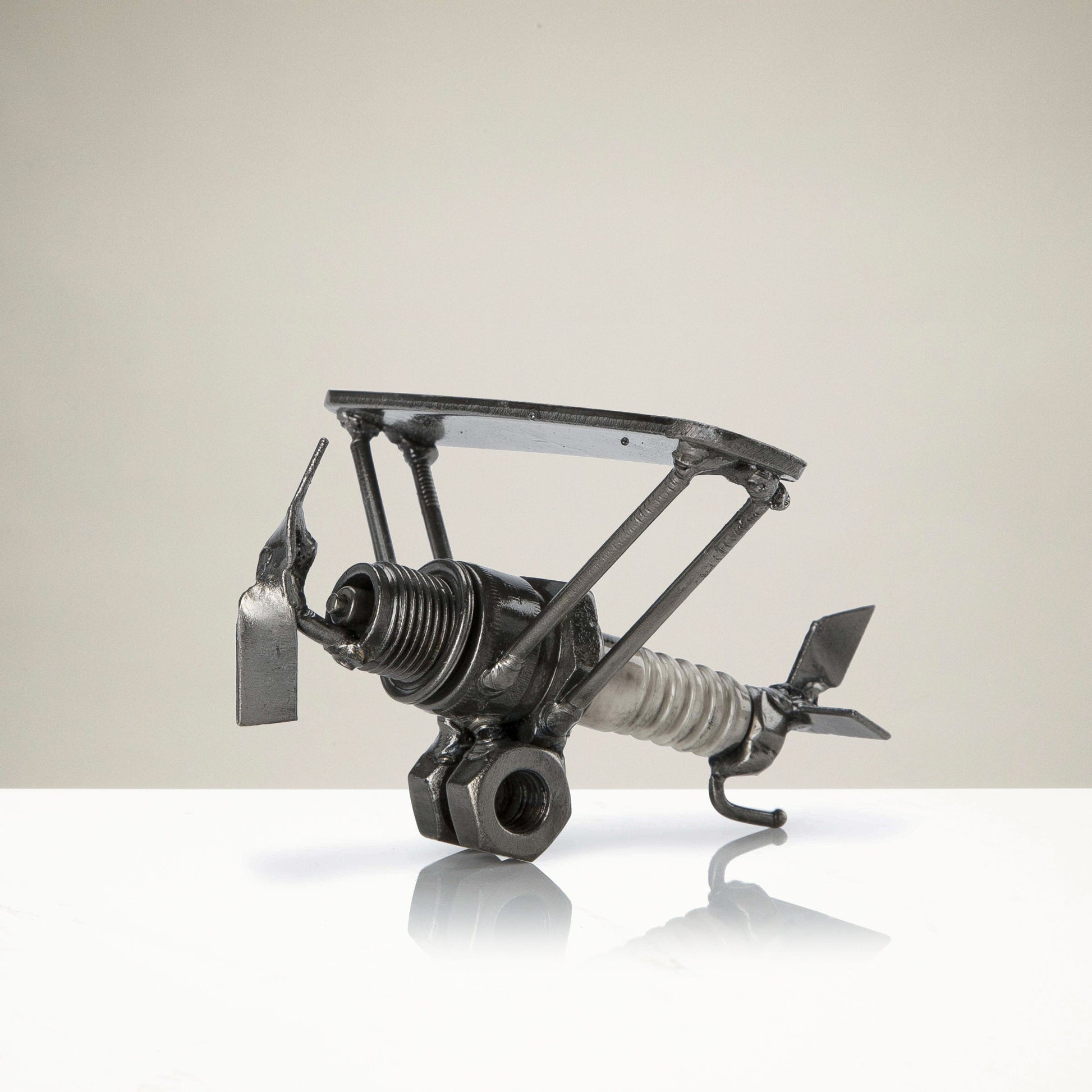 Airplane metal sculpture side view
