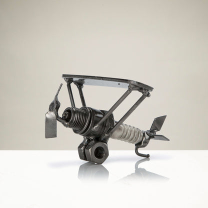 Airplane metal sculpture side view