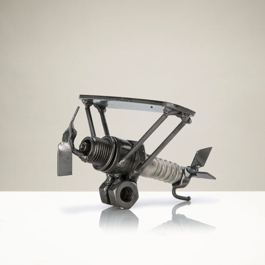 Airplane metal sculpture side view
