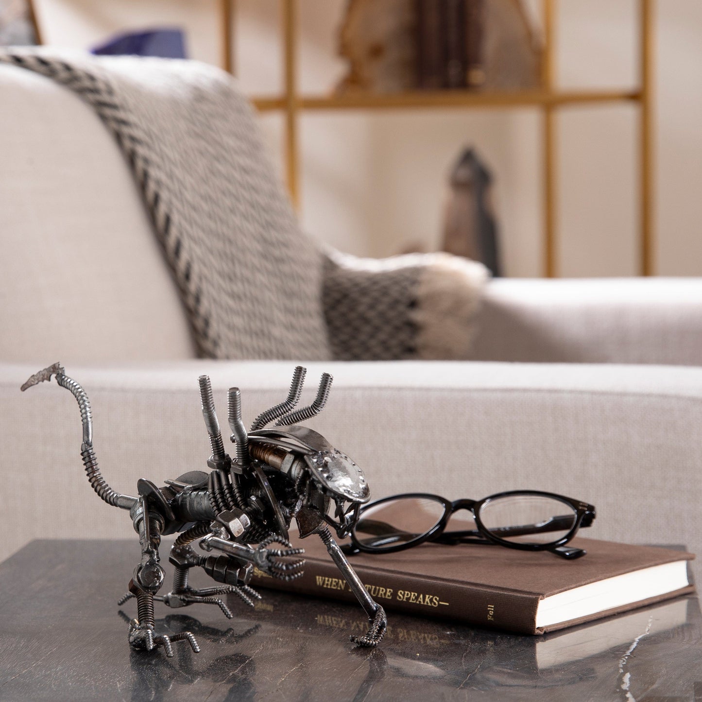 Alien crouched sculpture front view