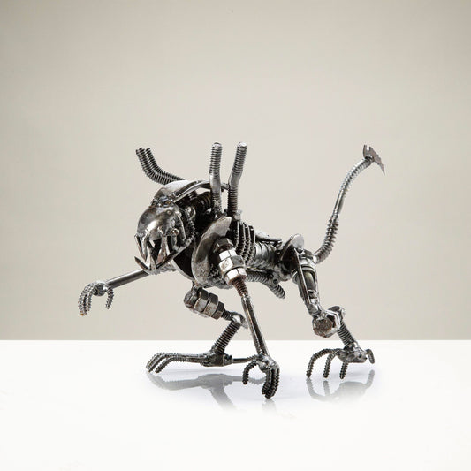 Alien crouched inspired recycled metal sculpture — Vault 88