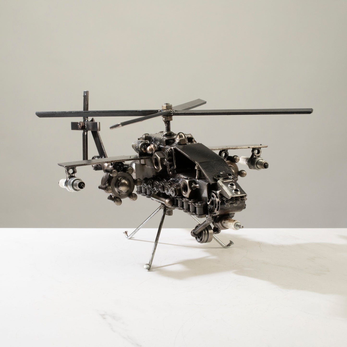 Apache helicopter recycled metal sculpture — Vault 88