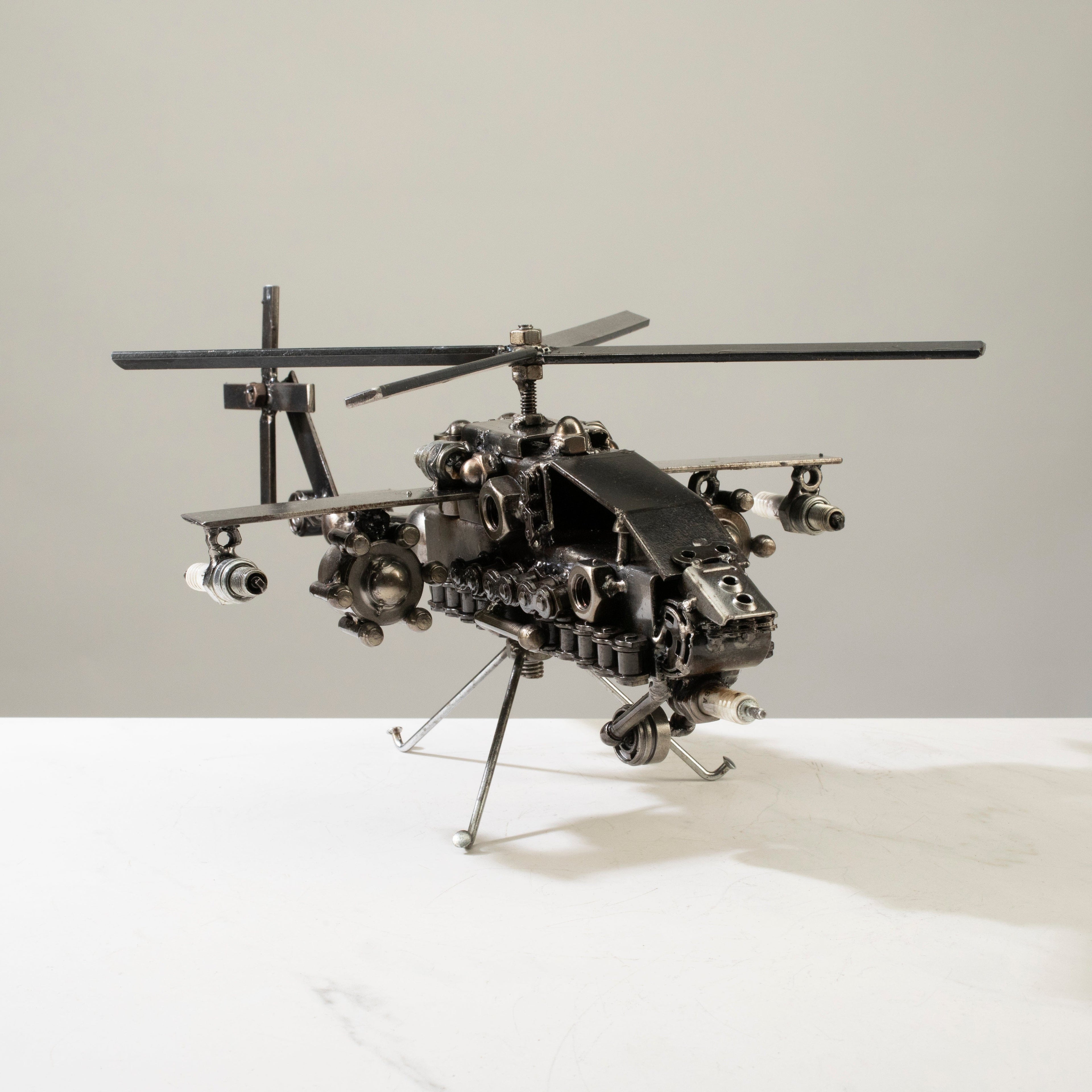 Apache helicopter recycled metal sculpture — Vault 88