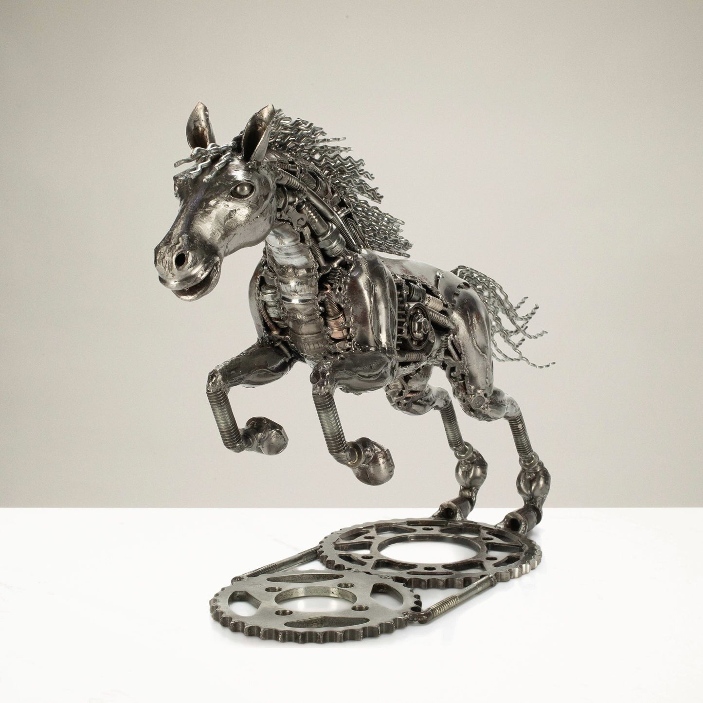 Running horse sculpture angle view