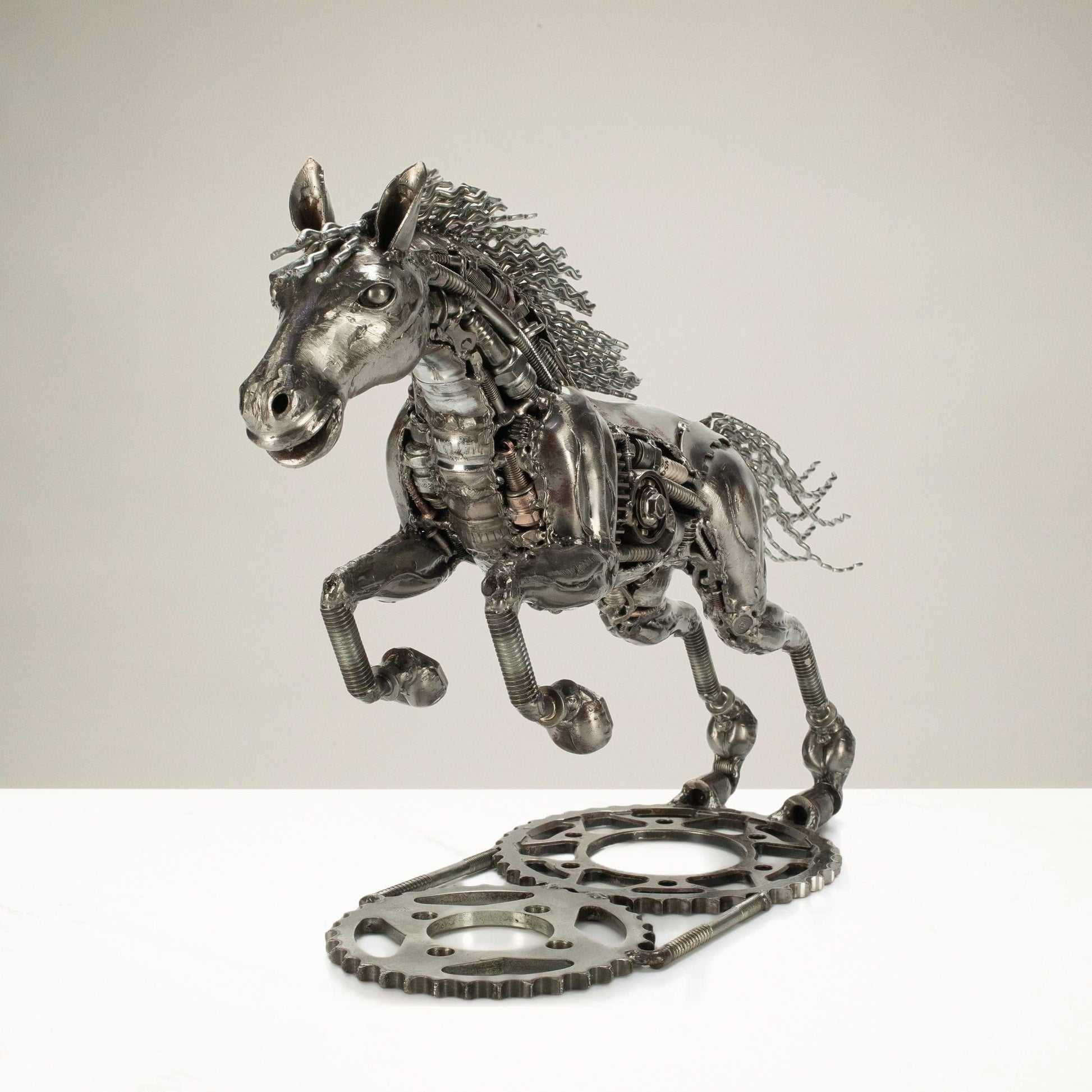 Running horse sculpture angle view