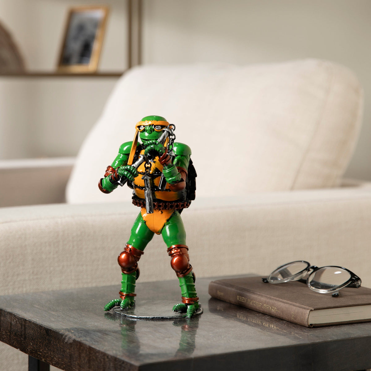 Michelangelo metal sculpture styled on a shelf — Vault 88