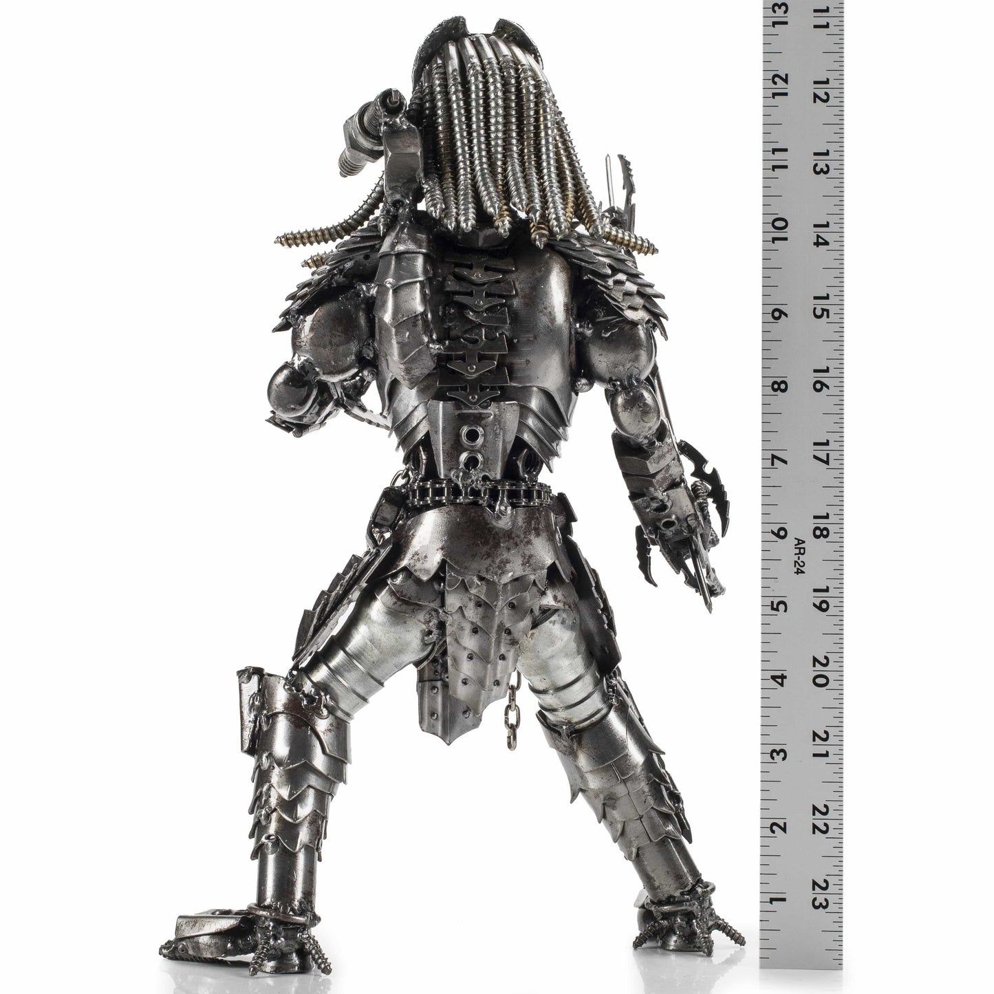 Predator brass sculpture side view