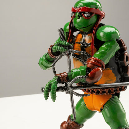 Raphael metal sculpture styled on a desk — Vault 88