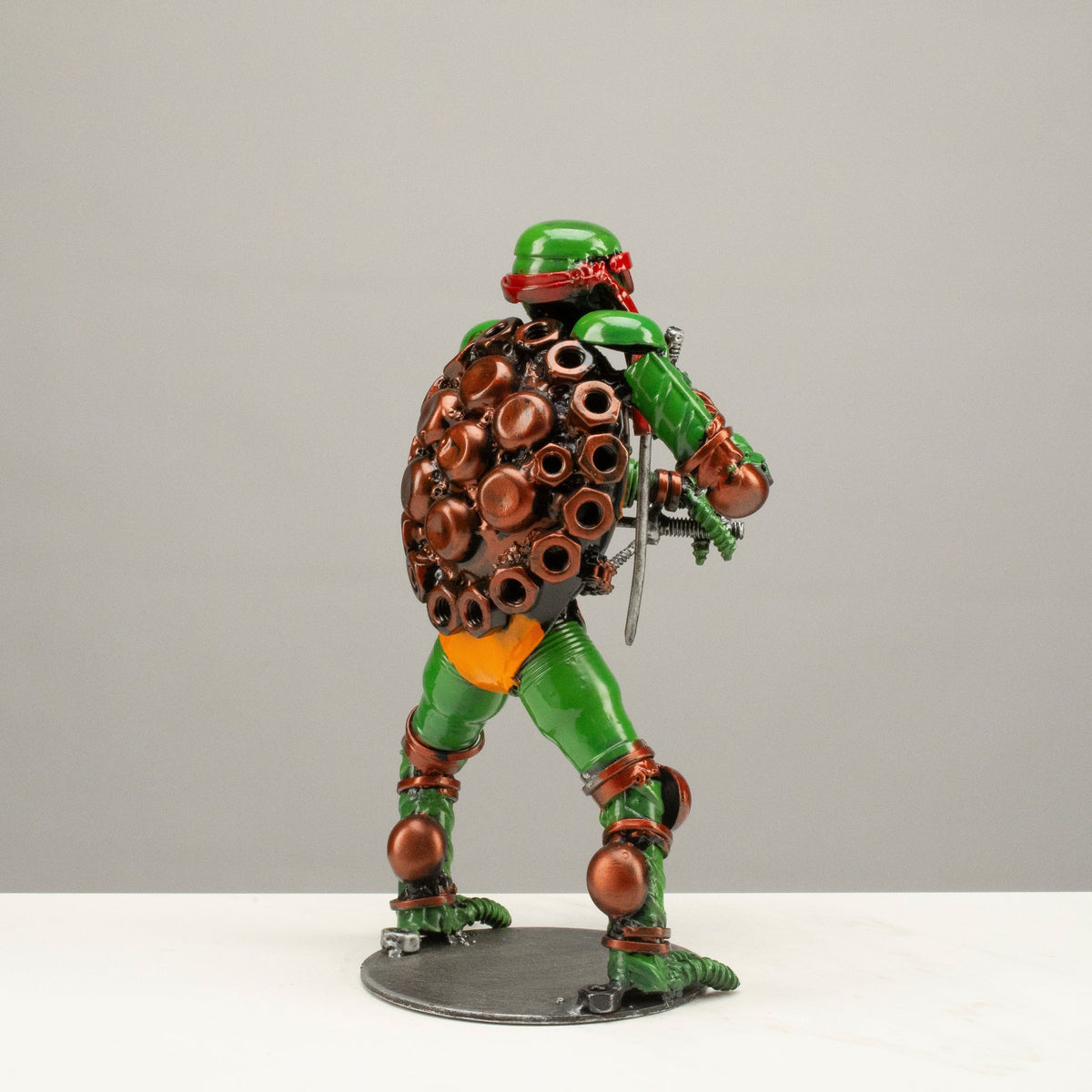 Raphael metal sculpture rear view — Vault 88