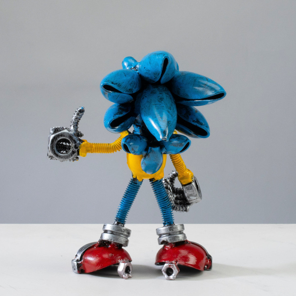 Sonic metal sculpture side profile — Vault 88