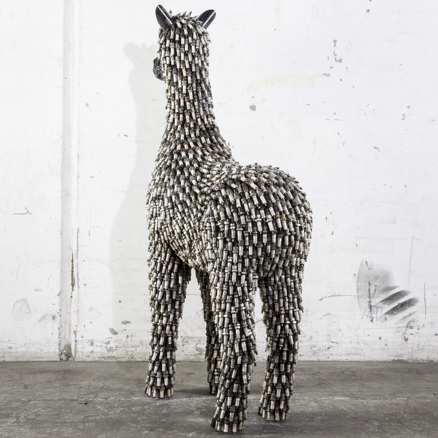 Spark plug alpaca sculpture face detail