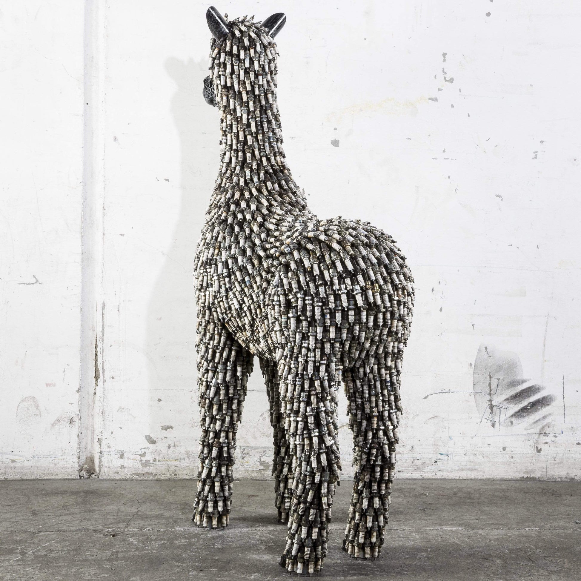 Spark plug alpaca sculpture face detail