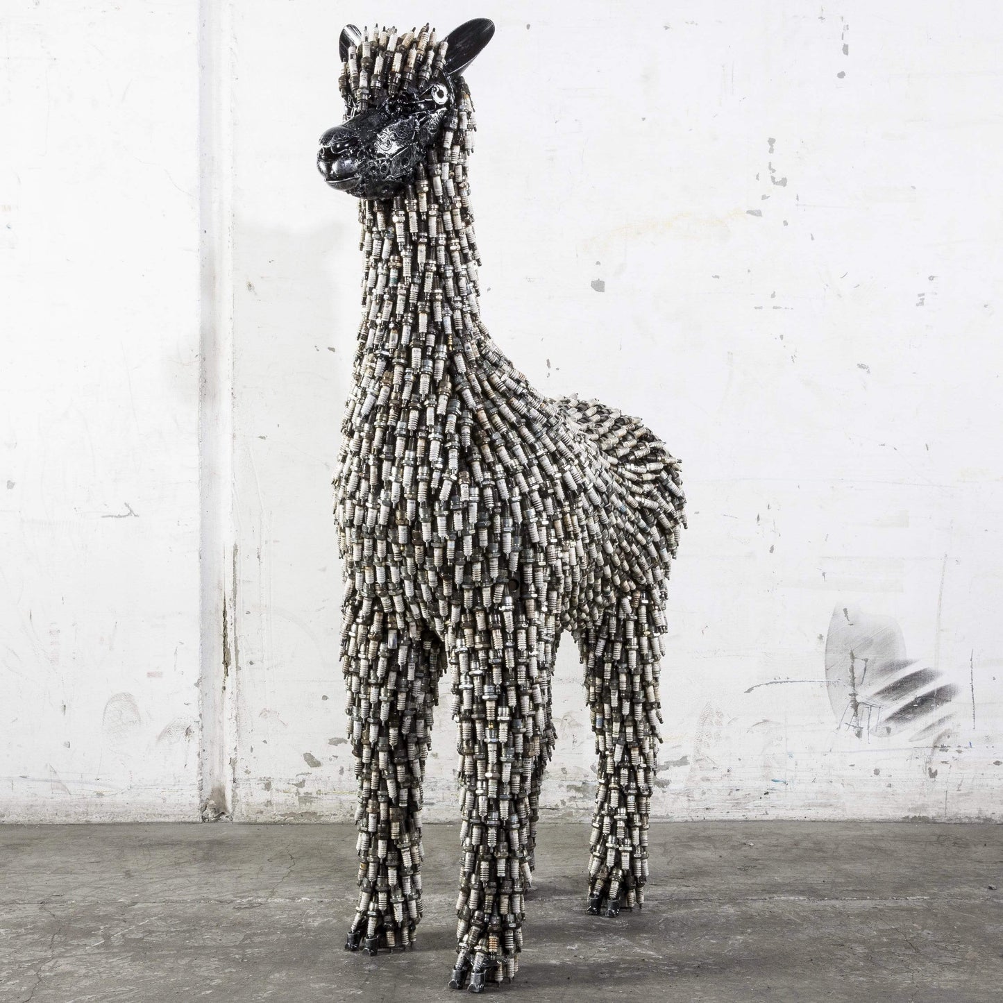 Spark plug alpaca sculpture full view