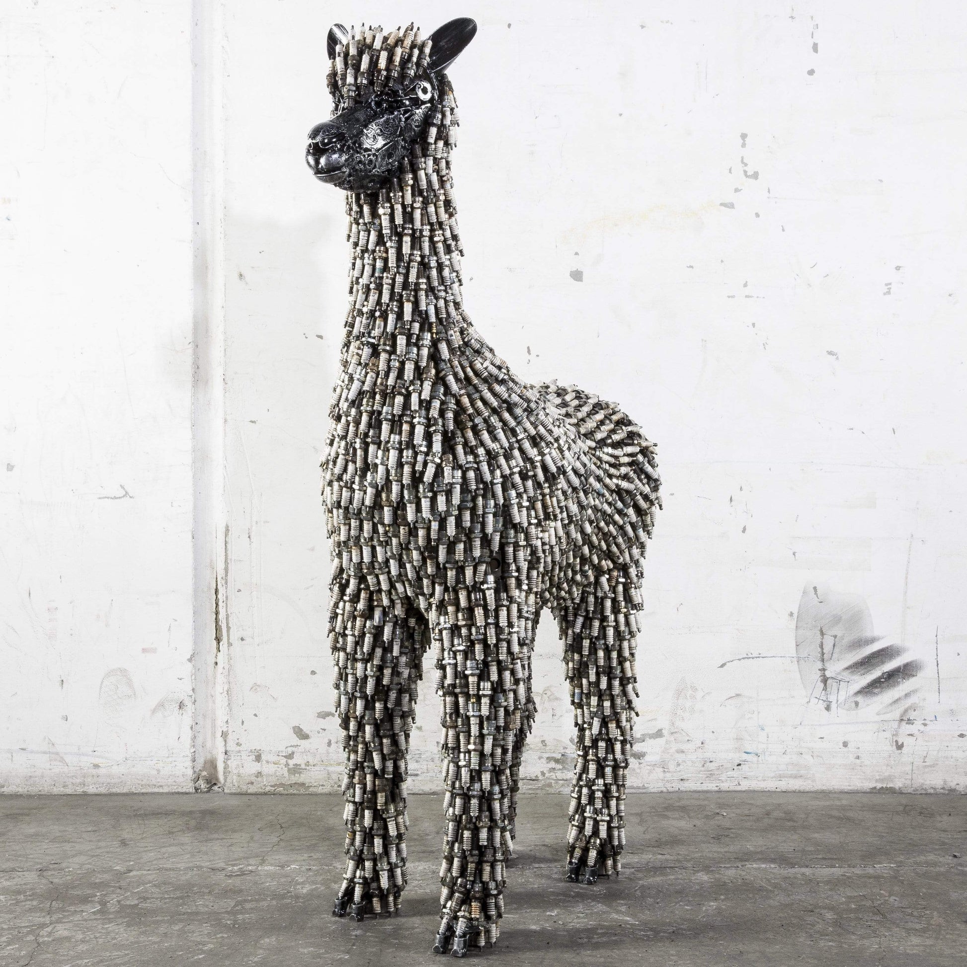 Spark plug alpaca sculpture full view