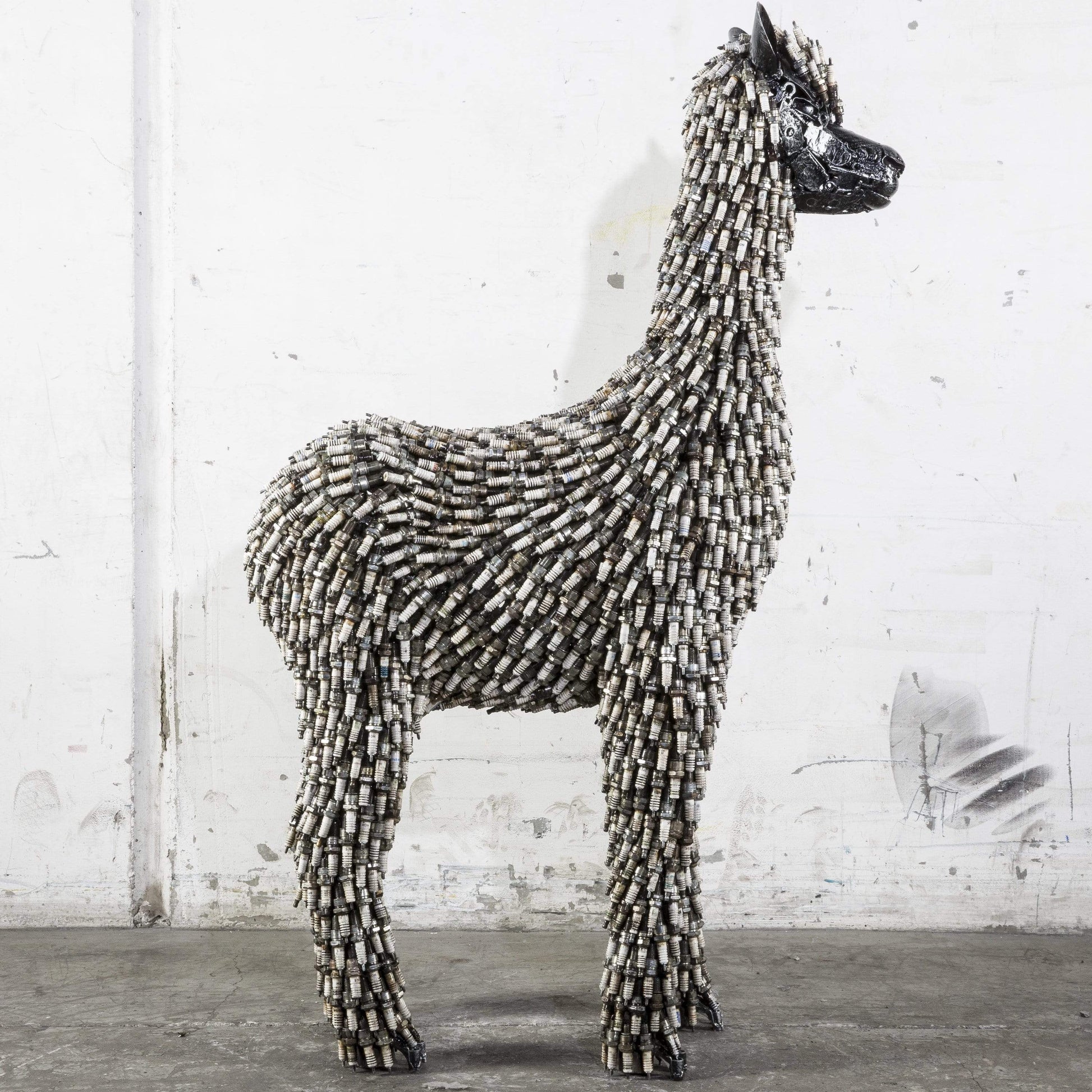 Spark plug alpaca sculpture plug detail