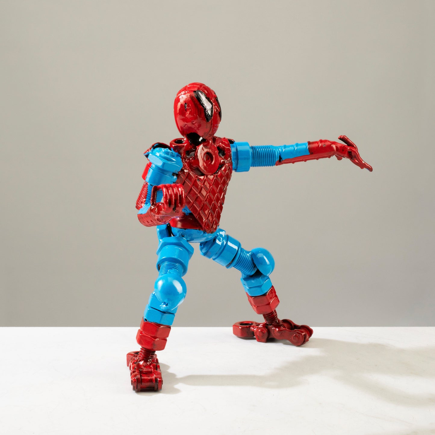 Spider Man metal sculpture side view