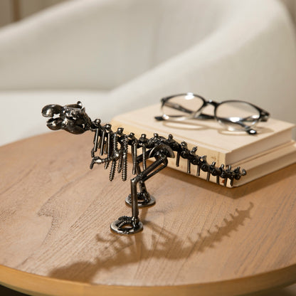 T-Rex metal sculpture styled on a table — Vault 88
