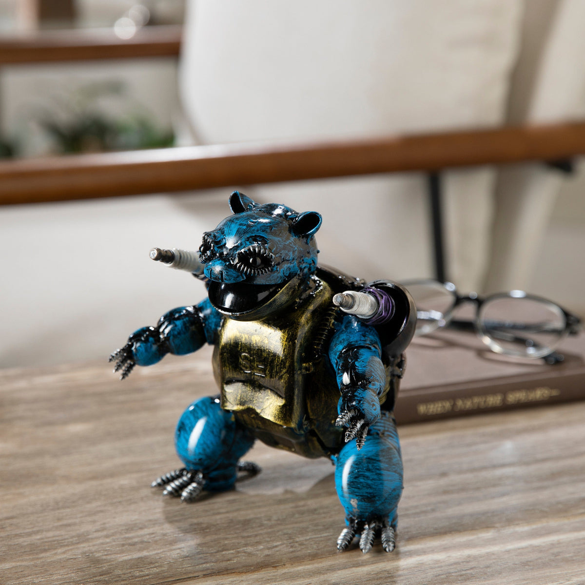 Blastoise Pokemon inspired recycled metal sculpture styled on a living room side table