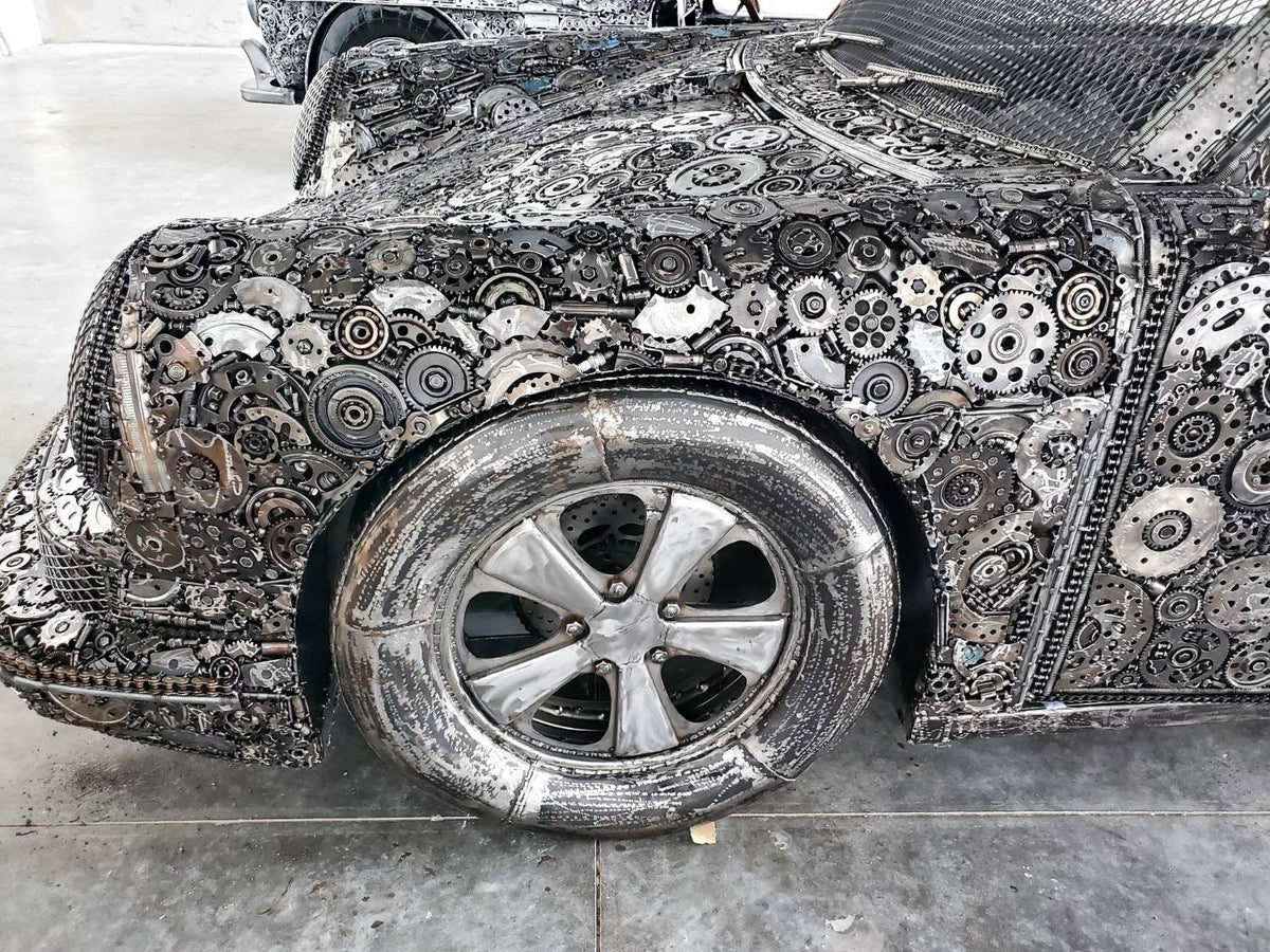 Carrera RS inspired full-scale classic recycled metal sculpture, front fender and wheel welded from gears