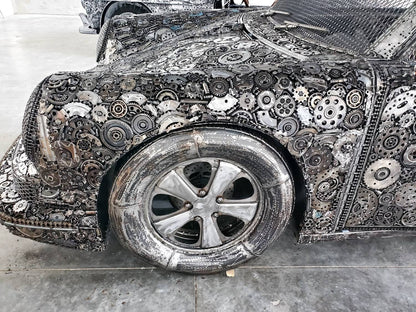 Carrera RS inspired full-scale classic recycled metal sculpture, front fender and wheel welded from gears