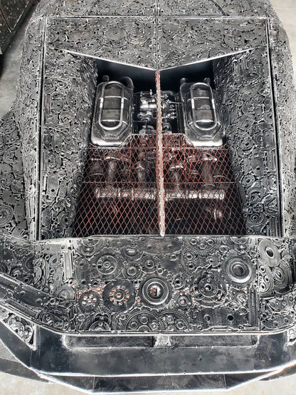Chiron-inspired full-scale hypercar recycled metal sculpture, sculpted engine bay detail