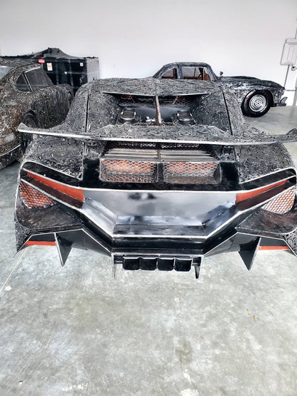 Chiron-inspired full-scale hypercar recycled metal sculpture, rear wing and taillight detail