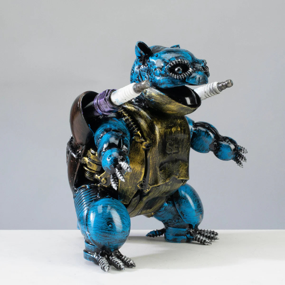 Blastoise Pokémon inspired recycled metal sculpture — side profile — Vault 88